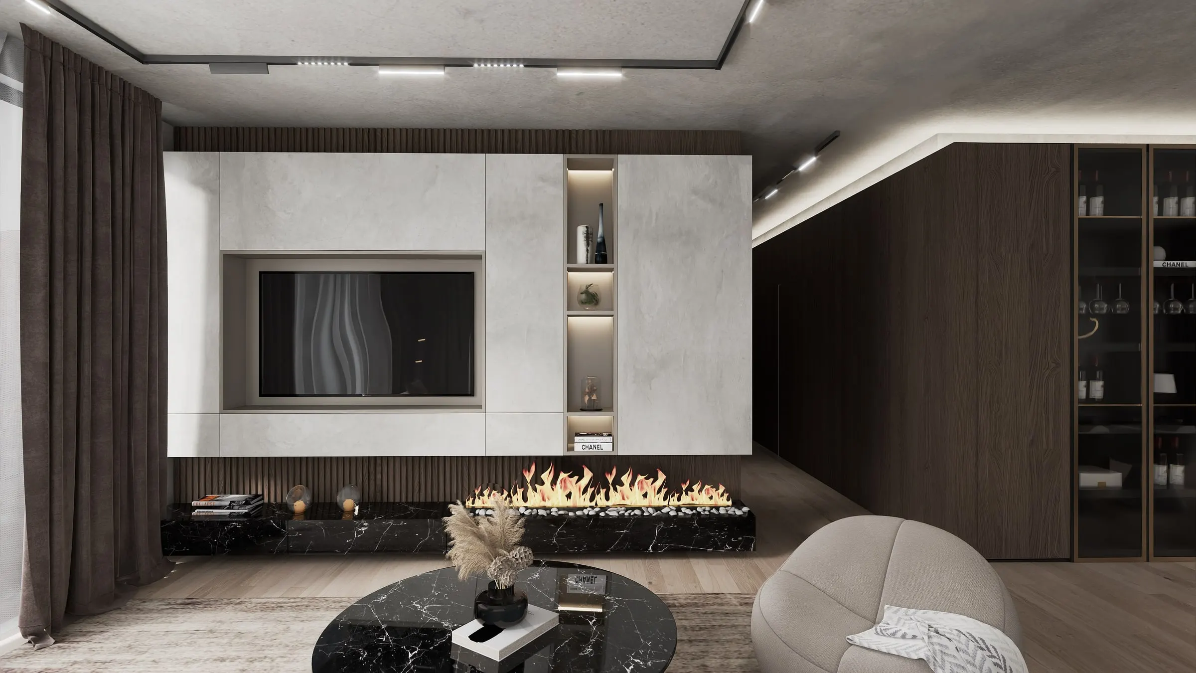 Living room with fireplace beneath the TV wall, round marble table and bean bag chair