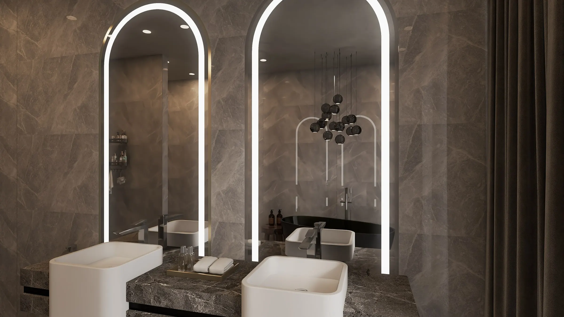 Bathroom with two vessel basins and illuminated arched mirrors