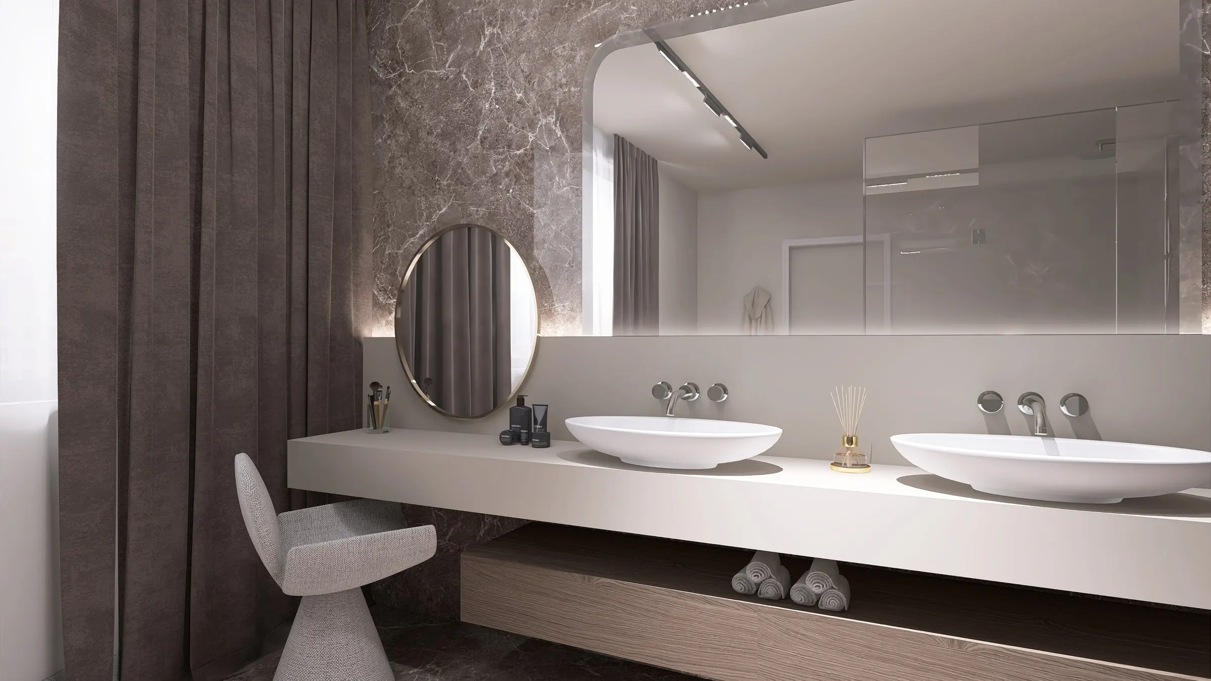 Bathroom with double vanity, round mirror and sculptural stool