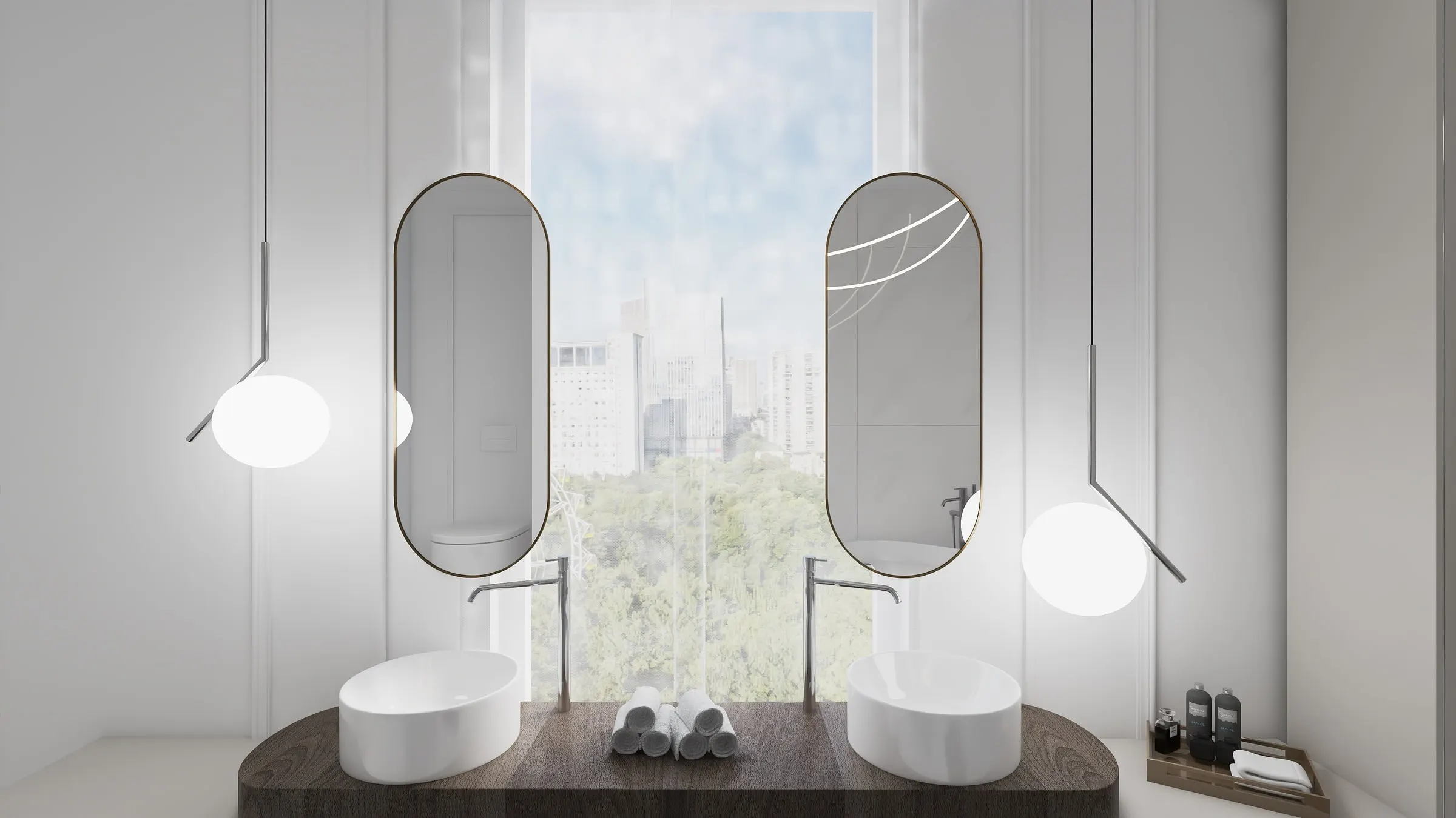Dark wood double vanity with two oval mirrors in front of a tall window